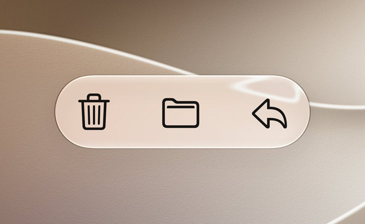 A Liquid Glass toolbar — the controls sit under a pane that refracts the content beneath, genuinely floating above it